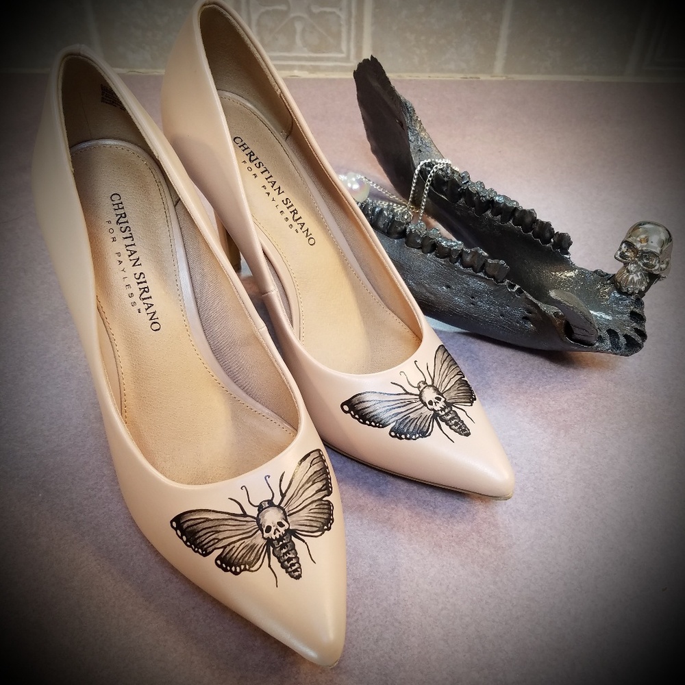 Handpainted Christian Siriano nude pumps.